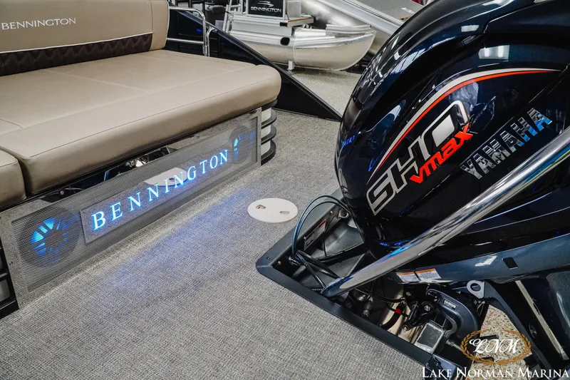 Slide: The Image of 2025 Bennington 24LXSSB pontoon boat with Yamaha SHO VMAX engine at Lake Norman Marina. - 7
