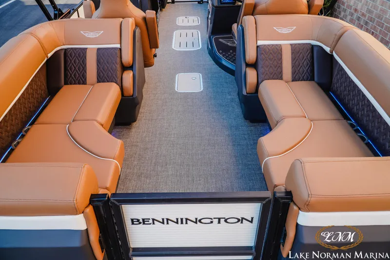 Slide: The Image of 2025 Bennington 24MFB boat interior with luxurious tan seating and elegant design. - 5