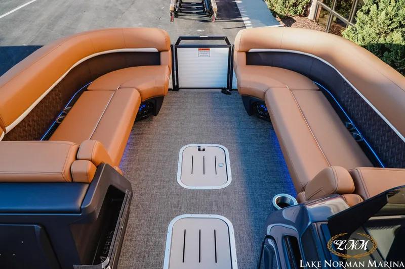 Slide: The Image of Luxurious interior of 2025 Bennington 24MFB pontoon boat with plush seating and modern design. - 9