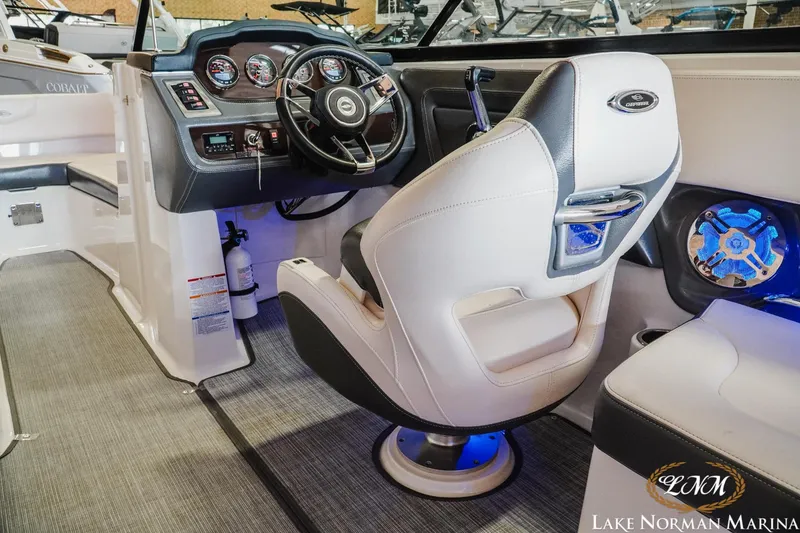 Slide: The Image of Interior of 2018 Chaparral 227 SSX boat with steering wheel and seating at Lake Norman Marina. - 8