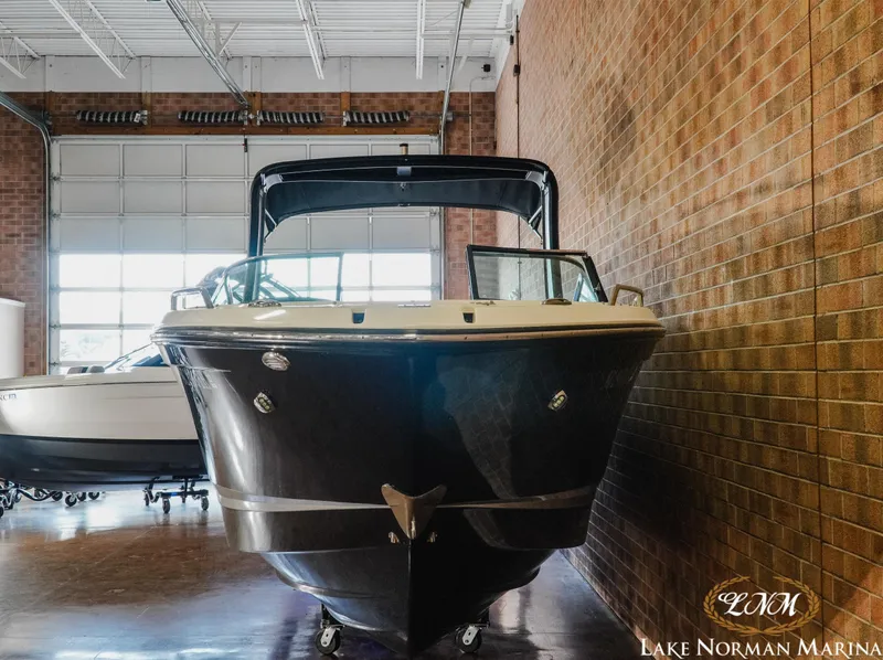 Slide: The Image of 2018 Chaparral 267 SSX boat displayed indoors at Lake Norman Marina. - 4