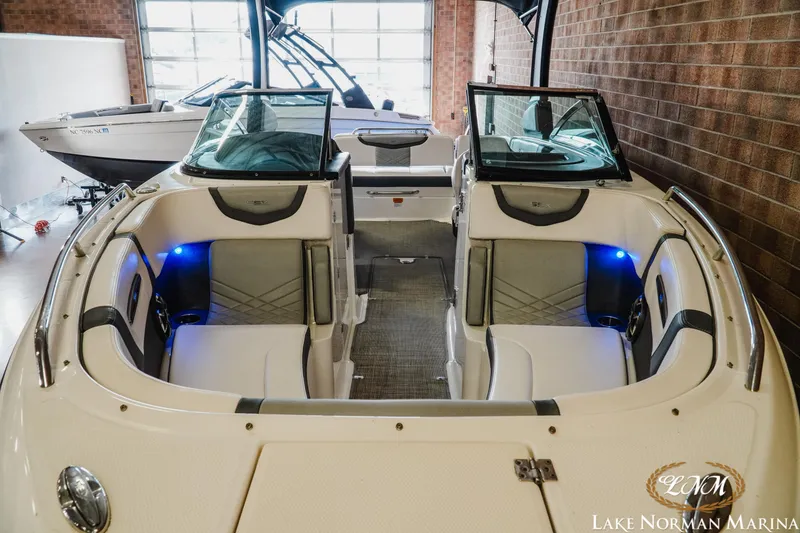 Slide: The Image of 2018 Chaparral 267 SSX boat interior with seating, displayed at Lake Norman Marina. - 5