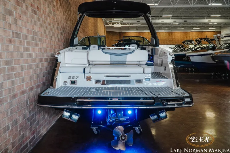 Slide: The Image of 2018 Chaparral 267 SSX boat displayed indoors at Lake Norman Marina. - 8