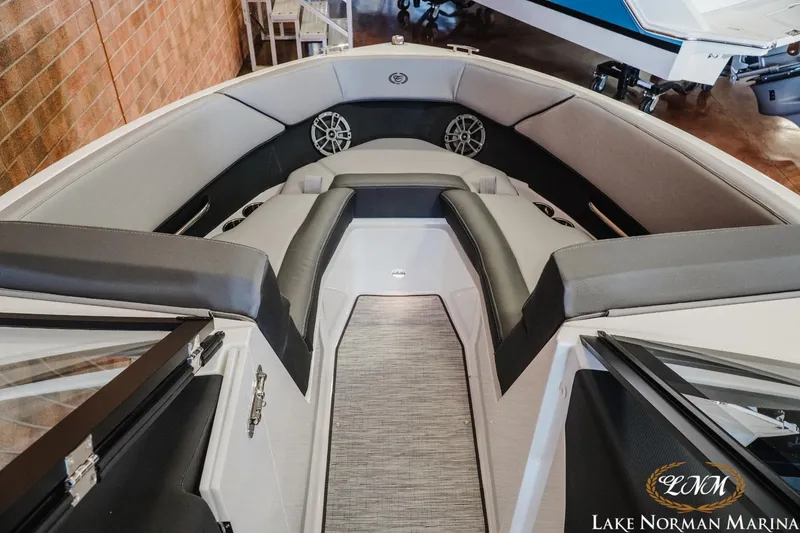 Slide: The Image of 2024 Cobalt CS22 boat interior with sleek seating and modern design at Lake Norman Marina. - 12