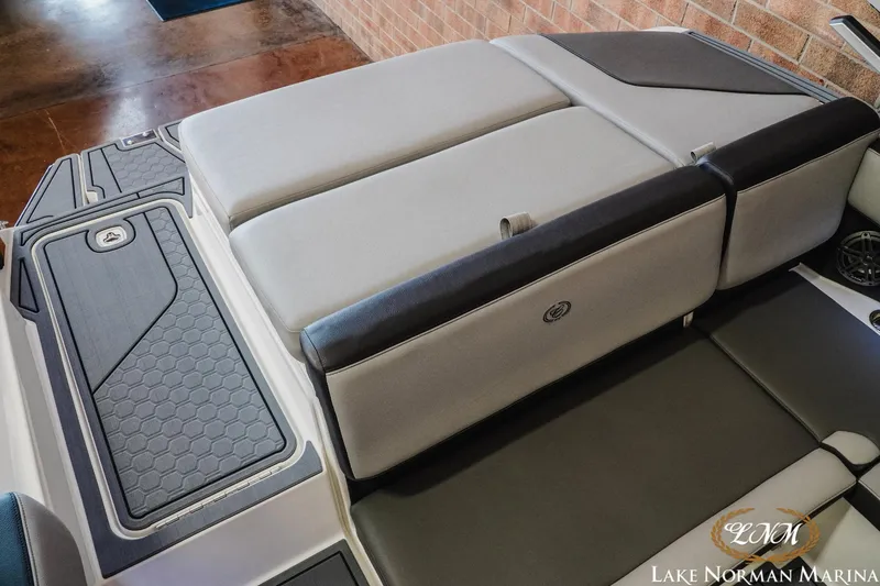 Slide: The Image of 2024 Cobalt CS23 Surf boat interior with sleek seating and modern design at Lake Norman Marina. - 20