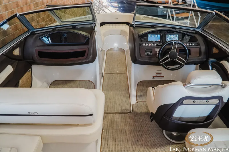 Slide: The Image of 2020 Cobalt R3 boat interior with modern dashboard and steering wheel at Lake Norman Marina. - 11