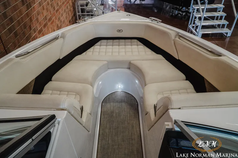 Slide: The Image of 2020 Cobalt R3 boat interior with beige seating at Lake Norman Marina. - 16