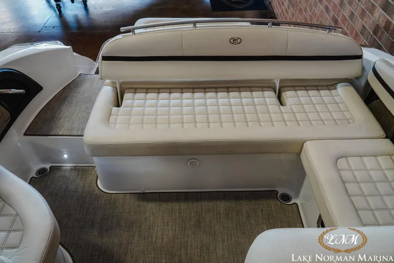 Slide: The Image of 2020 Cobalt R3 boat interior with beige cushioned seating at Lake Norman Marina. - 21