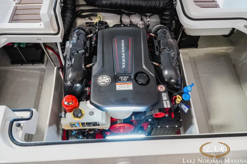 Slide: The Image of 2020 Cobalt R3 boat engine compartment featuring a Volvo Penta V8 300 engine. - 23