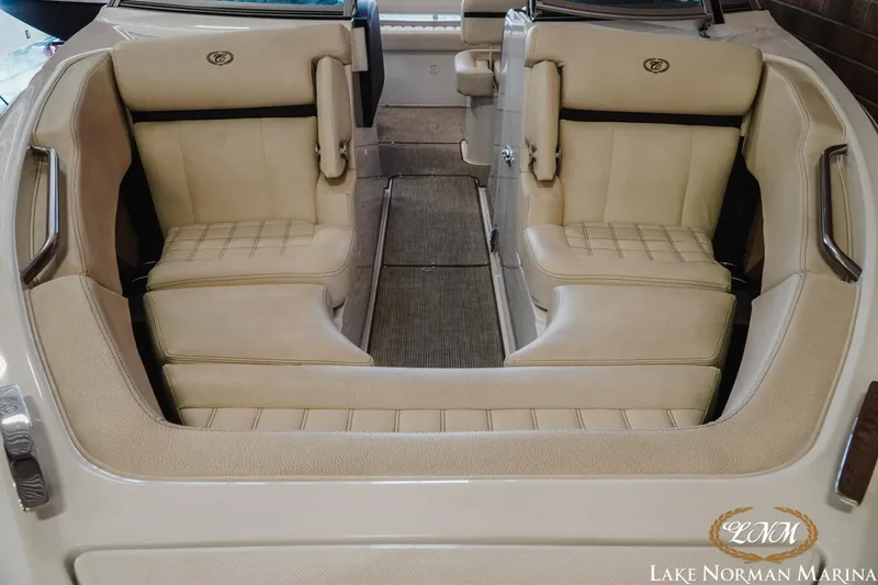 Slide: The Image of 2020 Cobalt R3 boat interior with beige seating at Lake Norman Marina. - 5