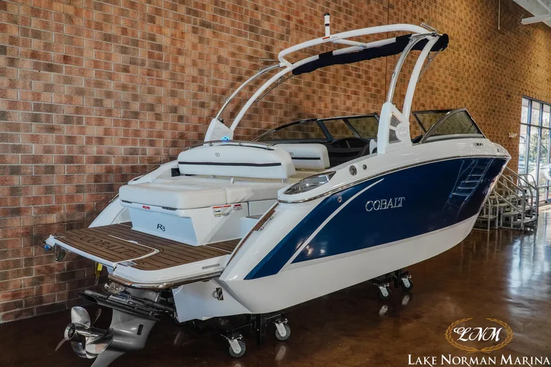 Slide: The Image of 2020 Cobalt R3 boat displayed indoors at Lake Norman Marina. - 7