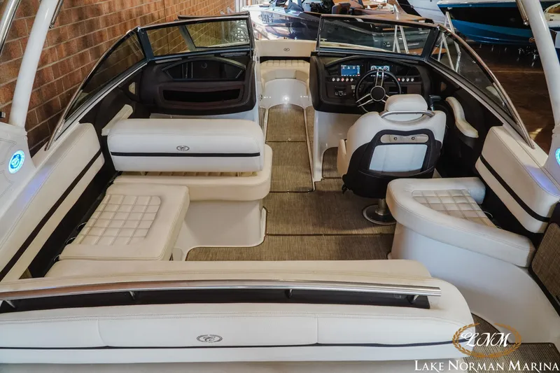 Slide: The Image of 2020 Cobalt R3 boat interior with luxurious seating and modern dashboard at Lake Norman Marina. - 9