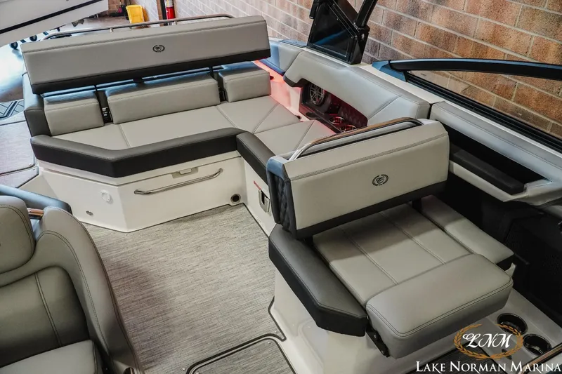 Slide: The Image of 2025 Cobalt R4 boat interior with luxurious gray seating and modern design at Lake Norman Marina. - 17