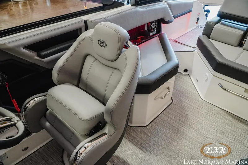 Slide: The Image of 2025 Cobalt R4 boat interior with luxurious seating and modern design at Lake Norman Marina. - 18