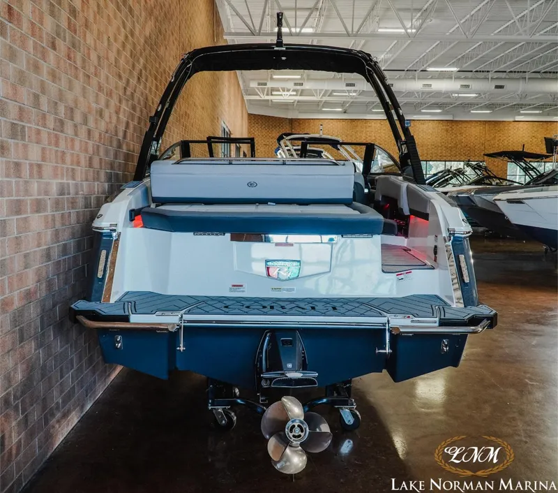 Slide: The Image of 2025 Cobalt R4 boat displayed at Lake Norman Marina showroom. - 4