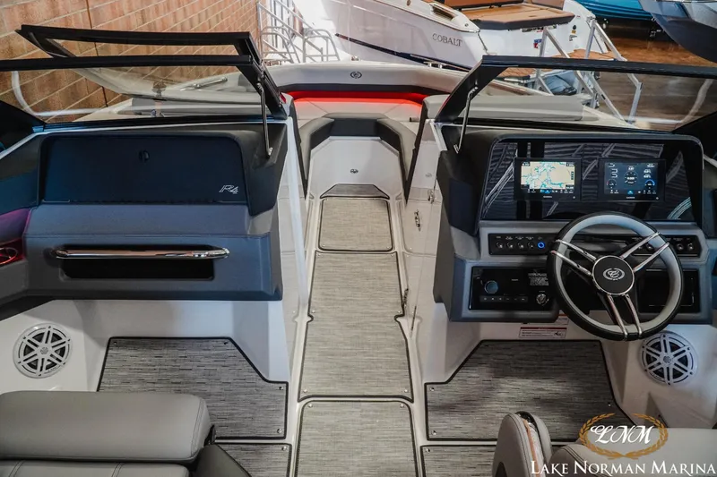 Slide: The Image of Interior of 2025 Cobalt R4 boat with modern dashboard and navigation system. - 9