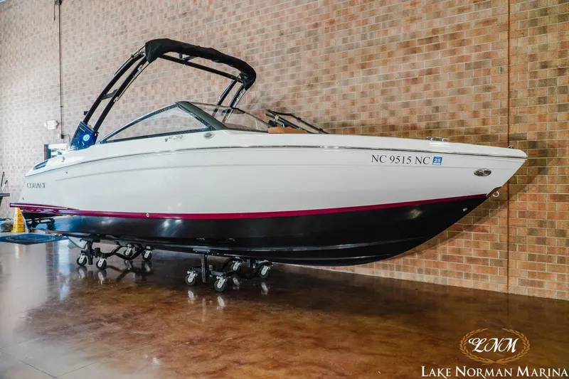 Slide: The Image of 2024 Cobalt R4 boat displayed indoors at Lake Norman Marina. - 3