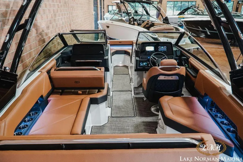 Slide: The Image of Interior of a 2022 Cobalt R4 boat with luxurious seating at Lake Norman Marina. - 9