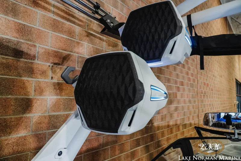 Slide: The Image of 2025 Malibu M230 boat speakers with modern design at Lake Norman Marina. - 28