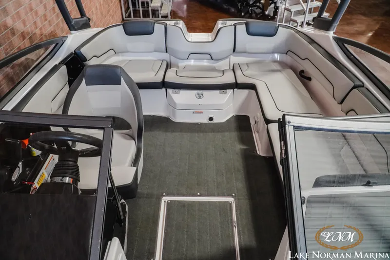 Slide: The Image of 2022 Yamaha Boats AR 190 interior with spacious seating and modern design at Lake Norman Marina. - 13