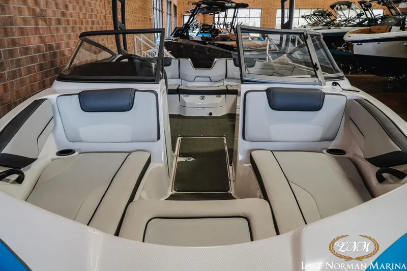 Slide: The Image of 2022 Yamaha Boats AR 190 interior at Lake Norman Marina, showcasing seating and design. - 5