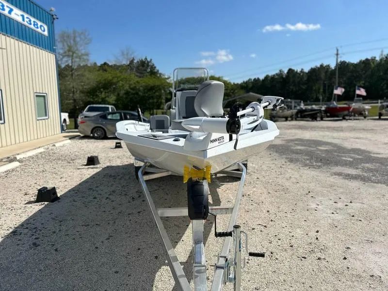 Slide: The Image of 2025 Xpress H22B boat on trailer in outdoor dealership lot. - 4