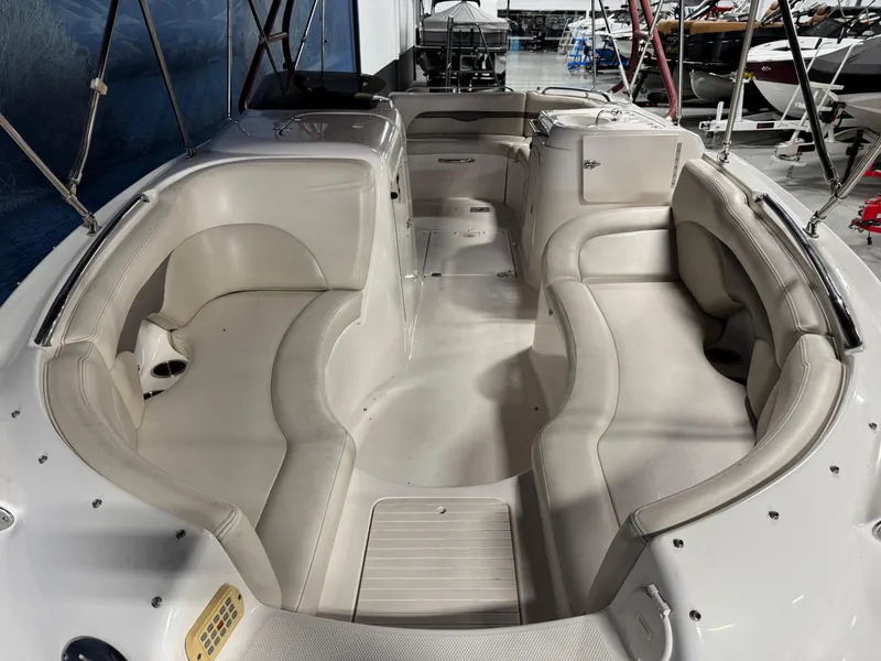 Slide: The Image of 2005 Chaparral Sunesta 232 boat interior with spacious seating and sleek design. - 13