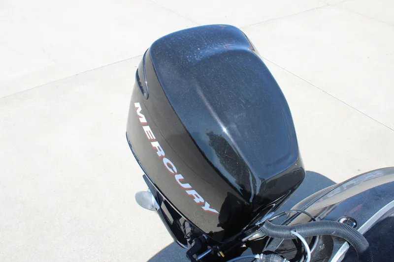 Slide: The Image of Outboard motor on a 2005 Nitro 901 CDX boat, featuring a black Mercury engine. - 21