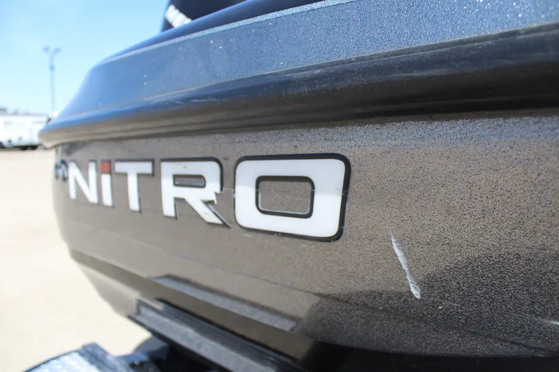 Slide: The Image of 2005 Nitro 901 CDX boat with visible logo and minor scratches. - 26