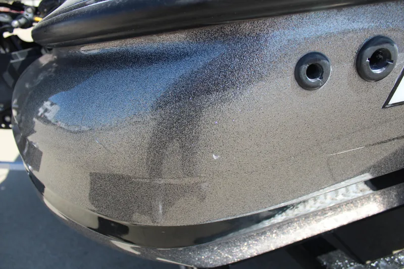 Slide: The Image of Close-up of a 2005 Nitro 901 CDX boat hull with metallic finish. - 27