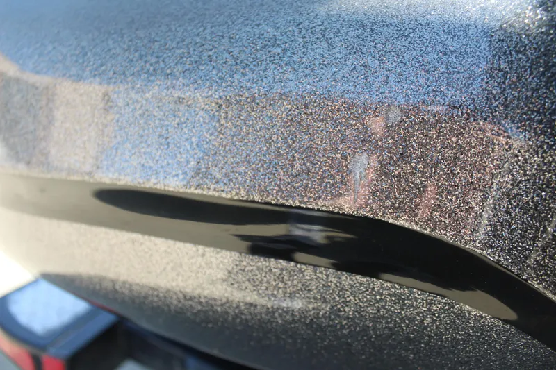 Slide: The Image of Metallic finish on 2005 Nitro 901 CDX boat, close-up view. - 29