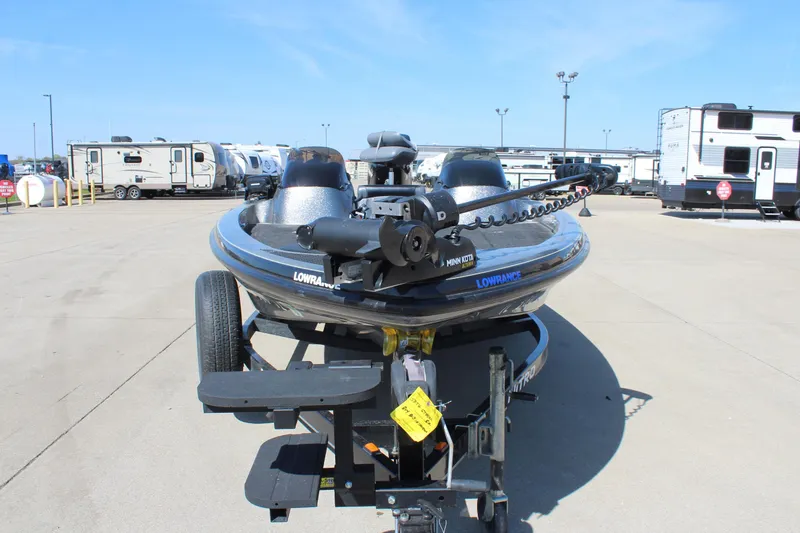 Slide: The Image of 2005 Nitro 901 CDX boat on trailer in parking lot with RVs in background. - 3