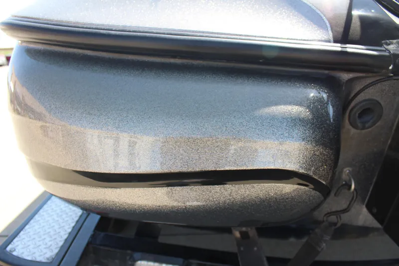 Slide: The Image of Close-up of a 2005 Nitro 901 CDX boat hull with metallic finish. - 30