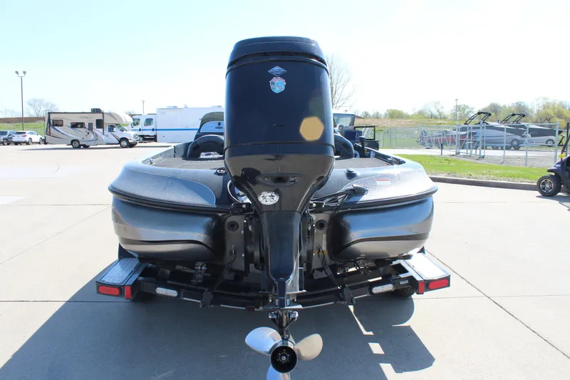 Slide: The Image of Rear view of a 2005 Nitro 901 CDX boat with outboard motor. - 7