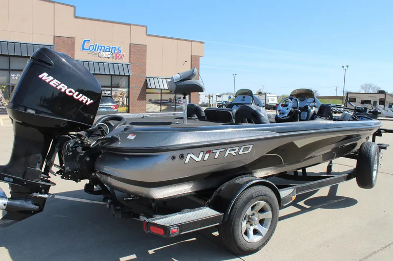 Slide: The Image of 2005 Nitro 901 CDX boat with Mercury engine parked outside dealership. - 8