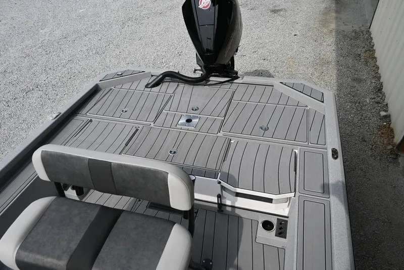 Slide: The Image of 2025 Vexus ACX2210 boat deck with seating and motor, featuring sleek gray design. - 6