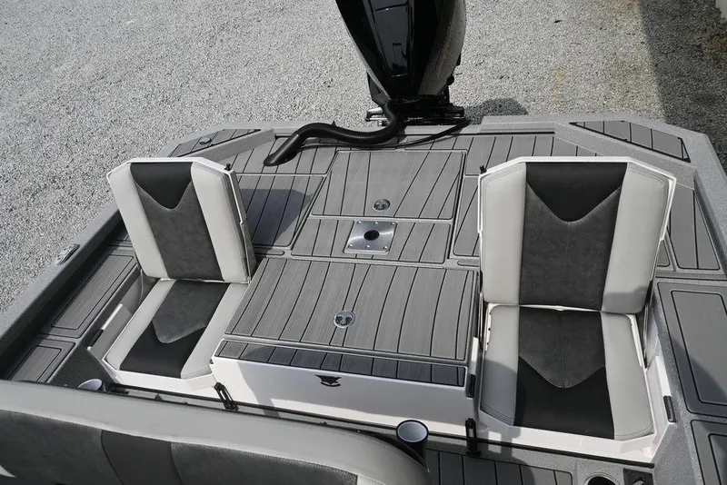 Slide: The Image of 2025 Vexus ACX2210 boat deck with seating and motor, featuring sleek gray design. - 9