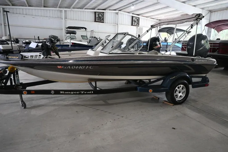 Slide: The Image of 2007 Ranger 180 Reata boat on trailer in indoor showroom. - 1
