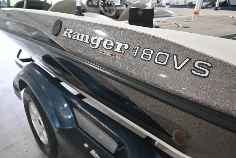 Slide: The Image of 2007 Ranger 180 Reata boat, close-up of model name and sleek design. - 5