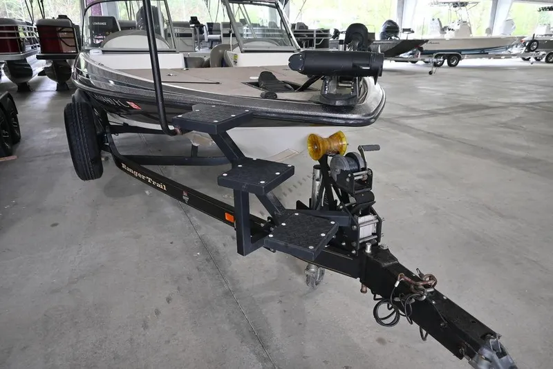 Slide: The Image of 2007 Ranger 180 Reata boat on trailer in indoor storage facility. - 6