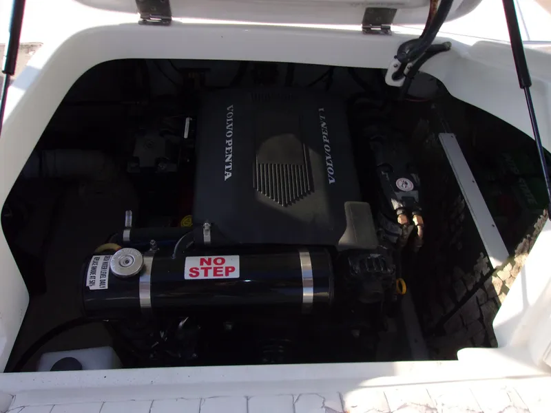 Slide: The Image of Engine compartment of a 2004 Cobalt 240SD boat with Volvo Penta engine. - 18