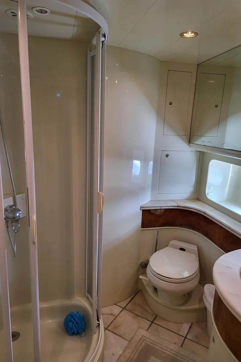 Slide: The Image of Bathroom interior of 2000 Horizon 74 Motor Yacht with shower and toilet. - 32