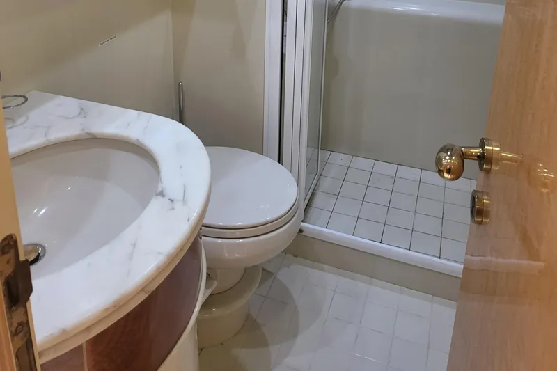 Slide: The Image of Bathroom in 2000 Horizon 74 Motor Yacht with marble sink and shower. - 44