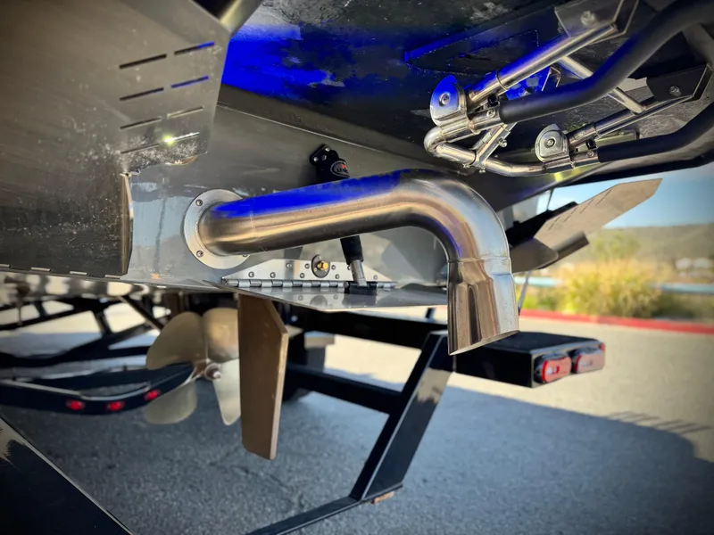 Slide: The Image of 2022 Tigé ATX 24 Type s boat exhaust and propeller detail. - 10