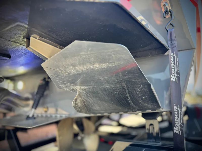 Slide: The Image of 2022 Tigé ATX 24 Type s boat hull detail with Boatmate trailer strap. - 13