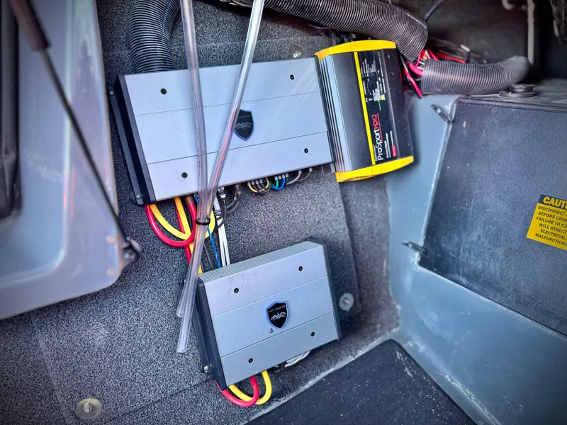 Slide: The Image of Electrical components inside a 2022 Tigé ATX 24 Type s boat. - 32