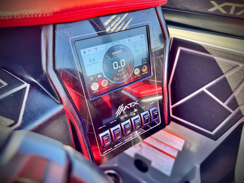 Slide: The Image of Touchscreen control panel of 2022 Tigé ATX 24 Type s boat interior. - 37