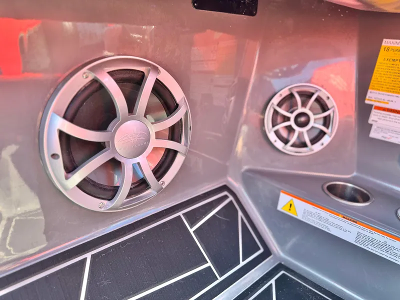 Slide: The Image of 2022 Tigé ATX 24 Type s boat speakers and interior details. - 39