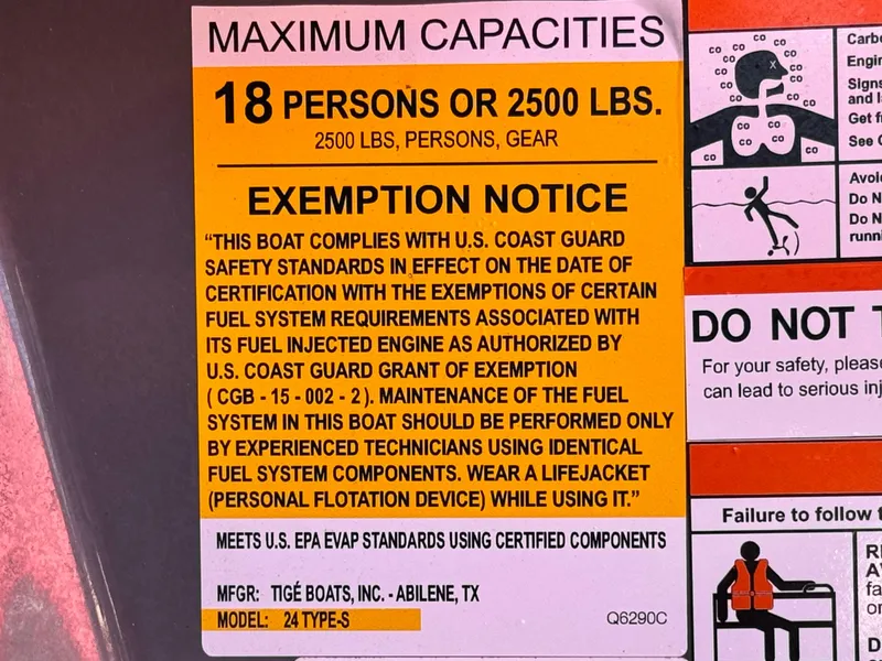 Slide: The Image of 2022 Tigé ATX 24 Type s capacity label: 18 persons or 2500 lbs, safety compliance notice. - 40