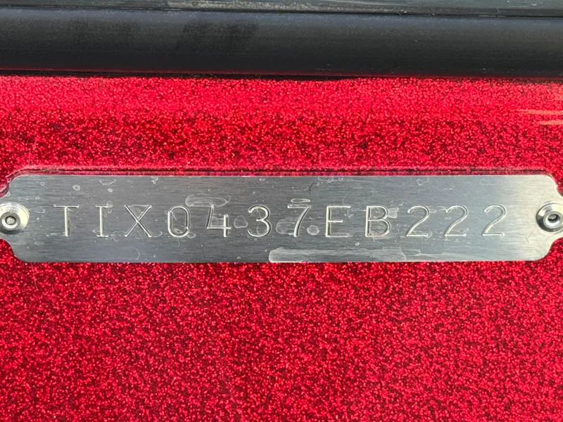 Slide: The Image of Red Tigé ATX 24 Type s 2022 boat with metal identification plate. - 41